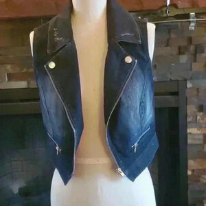 Distressed denim vest